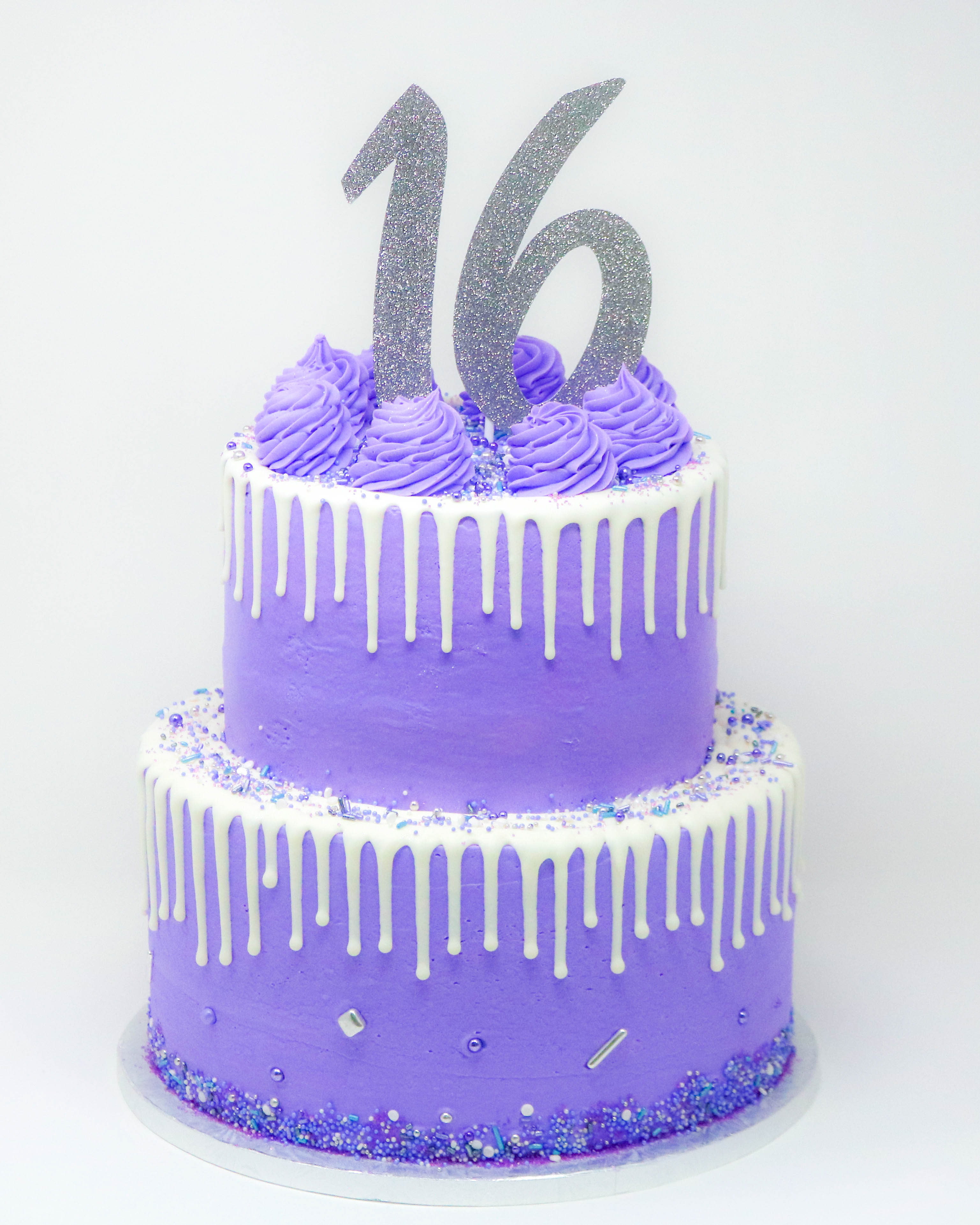 Sprinkles and dripping 2 tier cake Da Cakes Houston