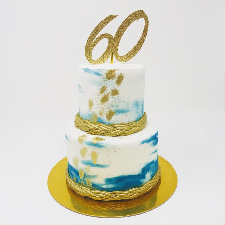 Gold and Blue Buttercream Cake with topper