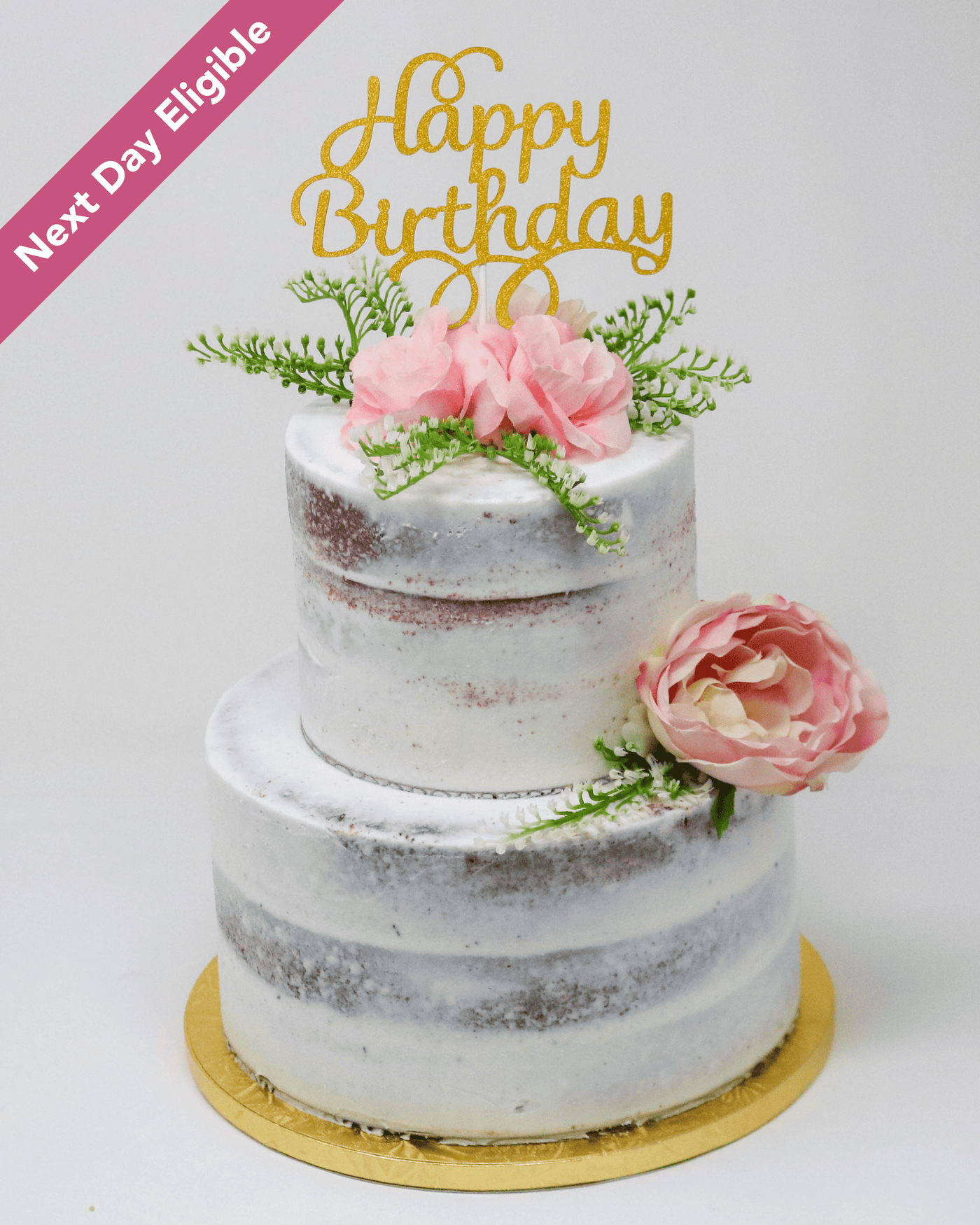 Two tier naked cake with flowers